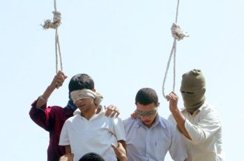 Blindfolded Mahmoud Asgari, 16, left, and another unidentified teenager are set to be publicly hanged, in Mashhad, Iran, on charges of raping boys in this photo taken on July 19, 2005. Nobel Peace laureate Shirin Ebadi Saturday condemned the execution of two under-18 boys in northeastern Iran, a punishment that has also reportedly prompted protests by gay groups around the world.(AP Photo)